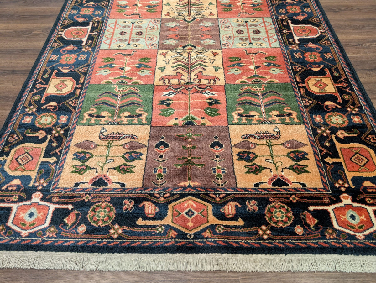 Karastan Rug 5' 9" x 8' 6", Chahar Mahal Village Garden 605, Wool USA 5' 9" x 8' 6" in Dark Blue, Blue, Ivory, Salmon Red, Yellow, Mauve and Multicolor - 2603L096