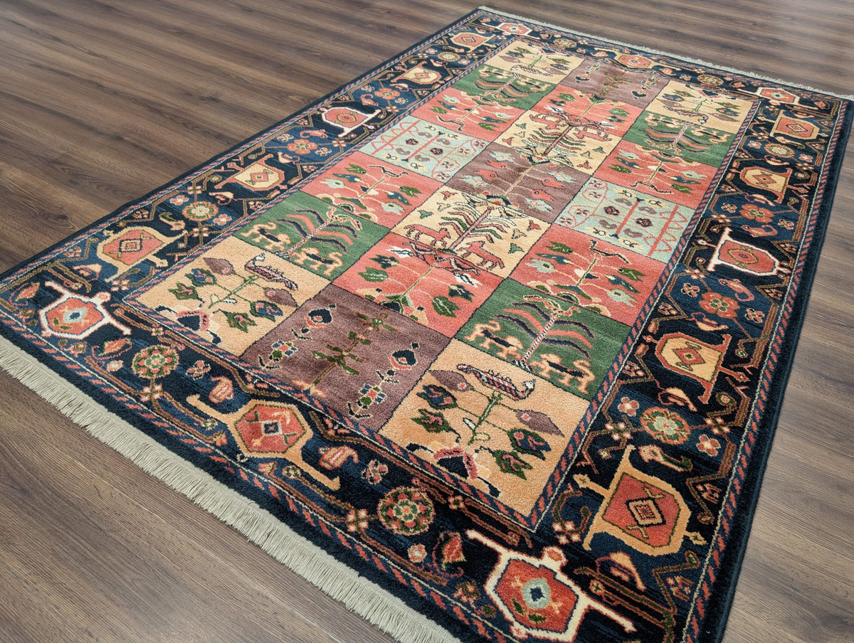 Karastan Rug 5' 9" x 8' 6", Chahar Mahal Village Garden 605, Wool USA 5' 9" x 8' 6" in Dark Blue, Blue, Ivory, Salmon Red, Yellow, Mauve and Multicolor - 2603L096