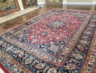 1950s Persian Mashad Rug 8' 3" x 11' 7", Room Sized Persian Carpet, Semi Antique, Medallion with Floral Allover Pattern, Red and Navy Blue Signature Master Weaver - Jewel Rugs